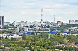 Вид на промзону со стороны посёлка Калуга в 2023 году