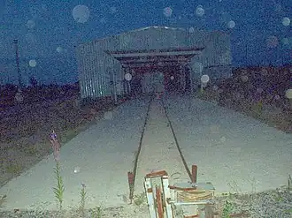 Шпалопропиточный цех в районе Карпогор, построенный в 2000 году для производства шпал для Белкомура