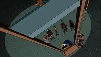 Пещерный человек хочет казнить Бэтмена и Золотого Бустера на гильотине