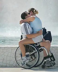 Фотография «Любовь паралимпийца» удостоенная в 2014 почётной грамоты Международного объединения фотографов