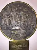 Медный медальон на стене Воскресенского Собора, отлитый русскими Белыми организациями Буэнос-Айреса в честь 1000-летя Крещения Руси в 1988 году