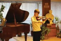 Незрячий музыкант в читальном зале РГБС