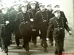 Старпом командира корабля капитан Тхагапсов М. М. во главе строя. СФ 1956.