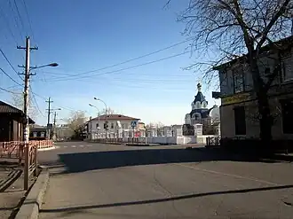 Вид на восток от пл. Банзарова на Спасскую церковь (новую) в ограде Одигитриевского собора