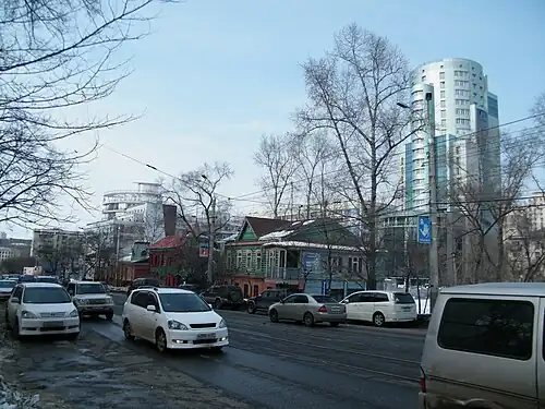 Ул.&nbsp;Шеронова, деревянная застройка конца XIX&nbsp;— начала XX века и современные здания.