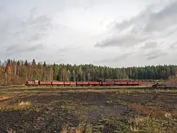 ТУ6А-1816 с грузовым поездом на погрузке торфа