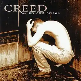 Обложка альбома Creed «My Own Prison» (1997)