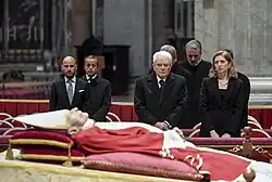 Pope Benedict XVI laying in St. Peter's Basilica