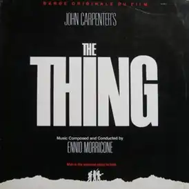 Обложка альбома Эннио Морриконе «The Thing — Original Motion Picture SoundtrackEnnio Morricone – The Thing - Original Motion Picture Soundtrack, 1982, [[MCA Records]], #:205 091 на сайте [[discogs.com]]  (неопр.). Дата обращения: 2011. Архивировано 27 октября 2011 года. (англ.)» ()